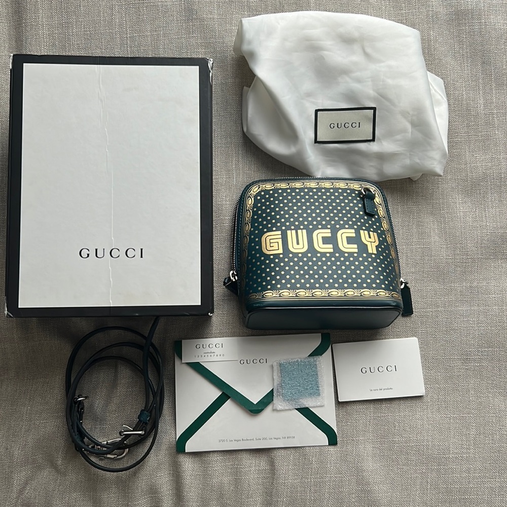 GUCCI WOMEN BLACK GUCCY SEGA SCRIPT DOME MINI CROSSBODY BAG